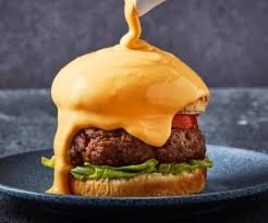 Hamburguesa Bañada en queso de res una carne